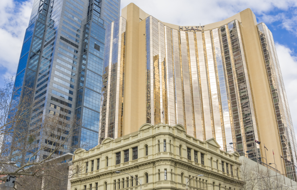 Grand Hyatt Hotel, Louis Vuitton store and modern building in Melbourne, Australia. Melbourne, Australia - August 16, 2015: Grand Hyatt Hotel, Louis Vuitton store and modern building in Melbourne s CBD during daytime.