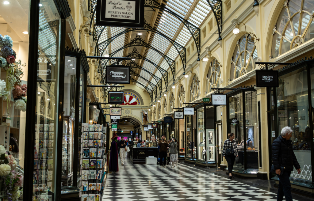 MELBOURNE, AUSTRALIA - APRIL 12, 2024: Shops at the Royal Arcade. The Royal Arcade features stunning Victorian architecture, characterized by its elegant archways, ornate ironwork, and glass-domed ceiling.