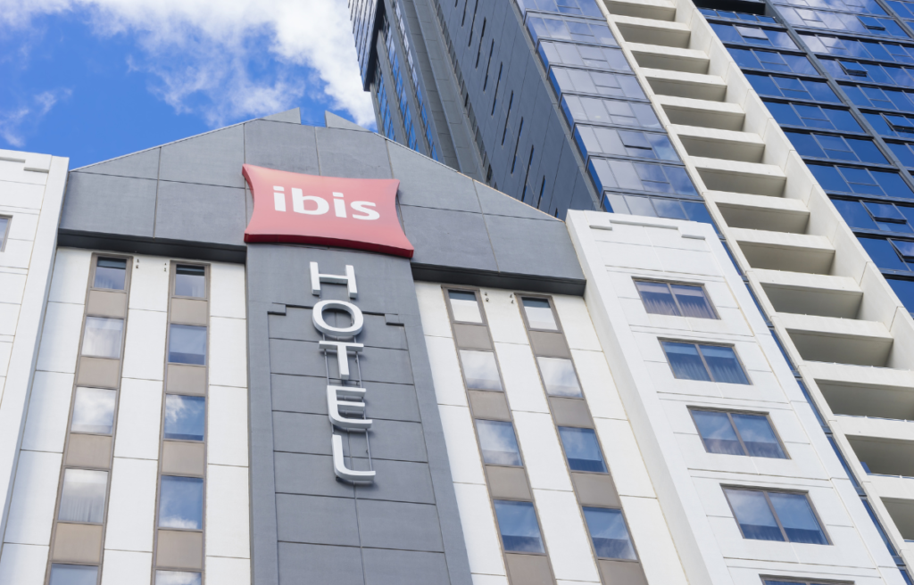 Ibis Melbourne Hotel and Apartments hotel in Melbourne s CBD during daytime. The ibis hotel group offers low rates compared to other hotel groups.